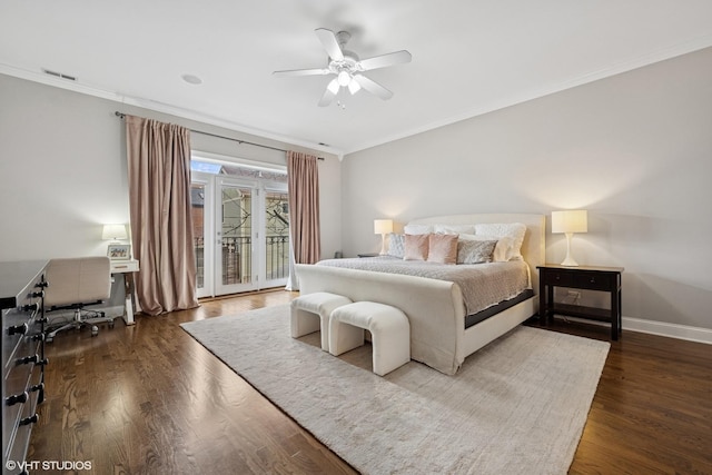bedroom with baseboards, ornamental molding, access to outside, and wood finished floors