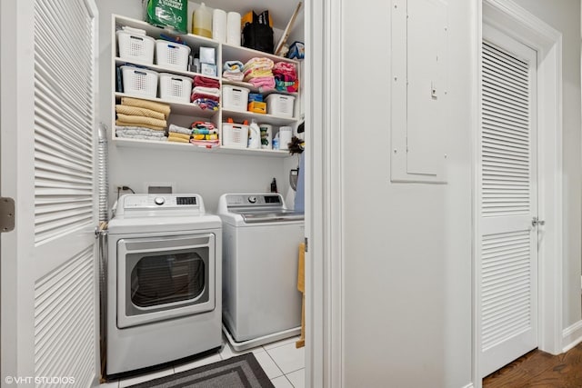 washroom with laundry area and washing machine and dryer