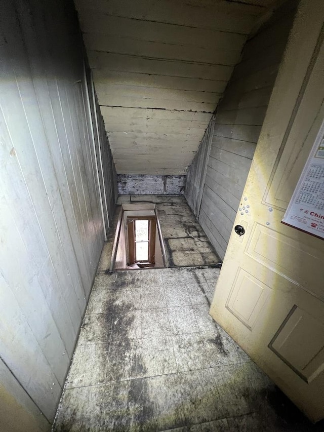 2342 S Trumbull Ave, Chicago, IL 60623 - hall with wooden walls, vaulted ceiling, and wood ceiling
