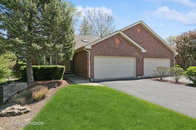 ranch-style house featuring asphalt driveway, brick siding, an attached garage, and a front yard