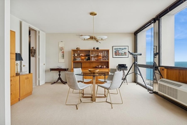 1240 N Lake Shore Dr Unit 9B, Chicago, IL 60610 - dining area with light colored carpet and a chandelier