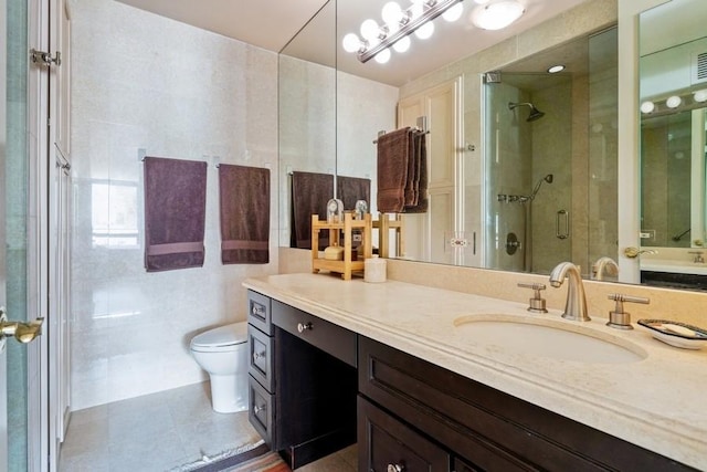 1240 N Lake Shore Dr Unit 9B, Chicago, IL 60610 - bathroom with tile patterned flooring, vanity, toilet, and a shower stall