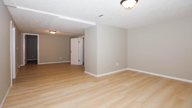 1201 S Mercer Ave, Bloomington, IL 61701 - empty room with light wood-style floors and baseboards
