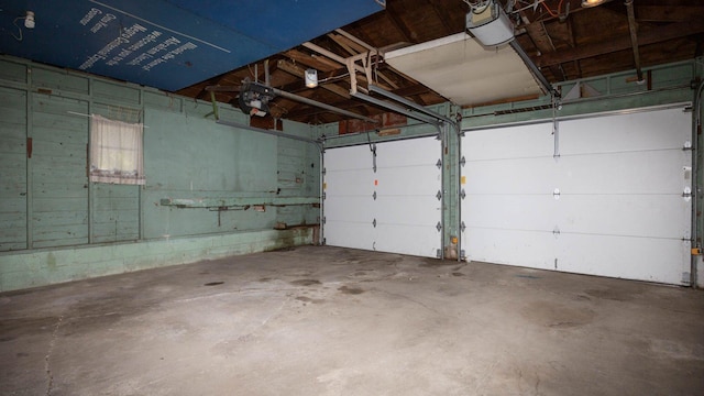1201 S Mercer Ave, Bloomington, IL 61701 - garage featuring a garage door opener