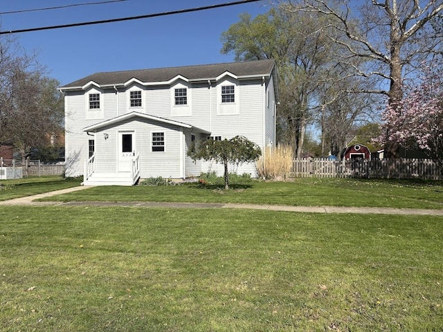300 N May St, Hinckley, IL 60520 - traditional-style house featuring fence and a front lawn