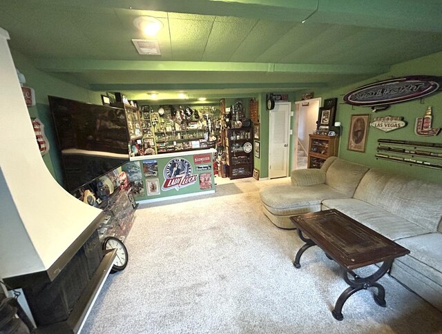 living room featuring visible vents and carpet