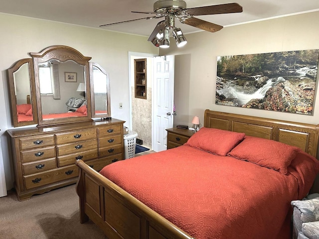 bedroom featuring ceiling fan and light carpet