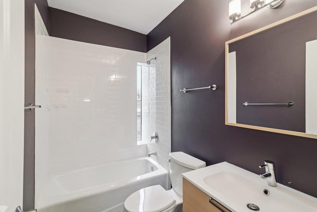 full bathroom featuring shower / bathtub combination, vanity, and toilet