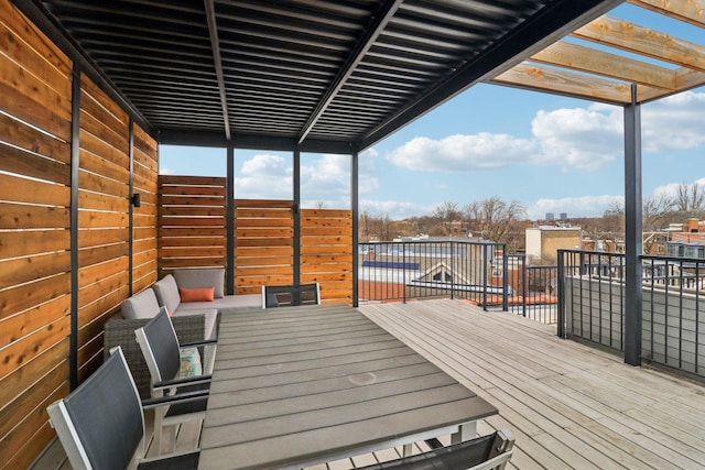 wooden deck with outdoor dining area
