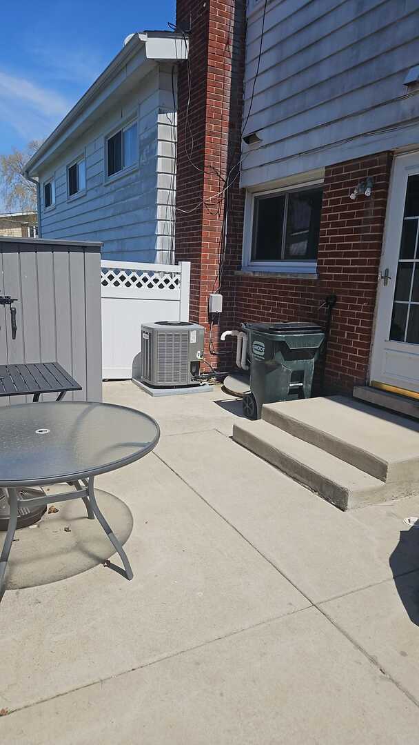 7013 W Greenleaf Ave, Niles, IL 60714 - view of patio / terrace with central AC unit