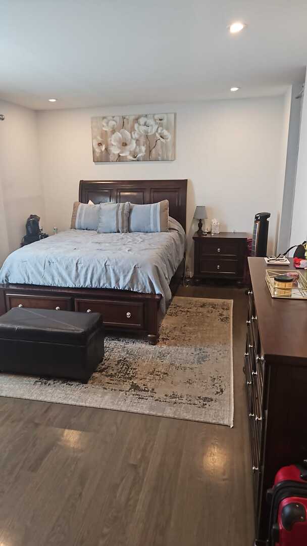 7013 W Greenleaf Ave, Niles, IL 60714 - bedroom featuring recessed lighting and wood finished floors