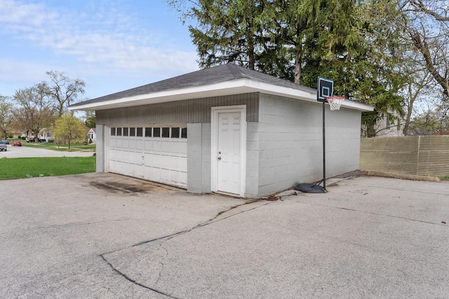 detached garage with fence