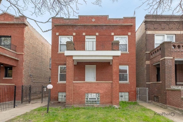 view of building exterior with fence