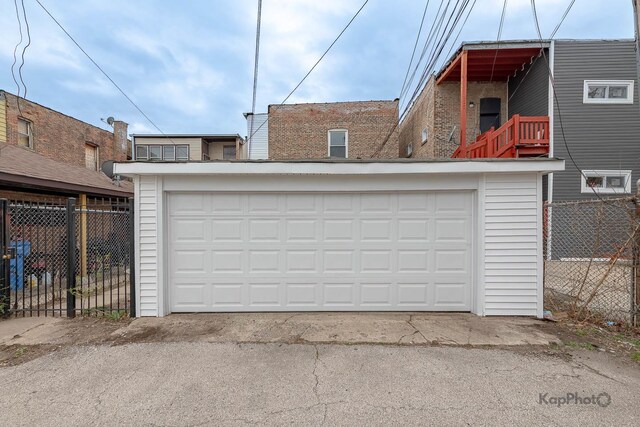 detached garage with fence