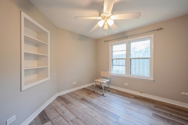 1578 Mccraren Rd, Highland Park, IL 60035 - unfurnished room with wood finished floors, ceiling fan, and baseboards