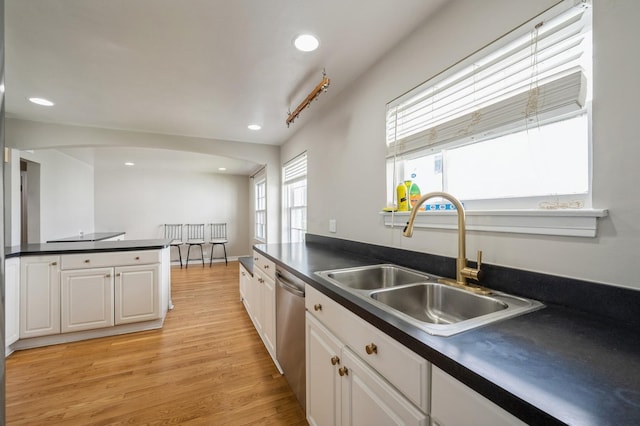 1578 Mccraren Rd, Highland Park, IL 60035 - kitchen featuring a sink, dishwasher, dark countertops, white cabinets, and recessed lighting