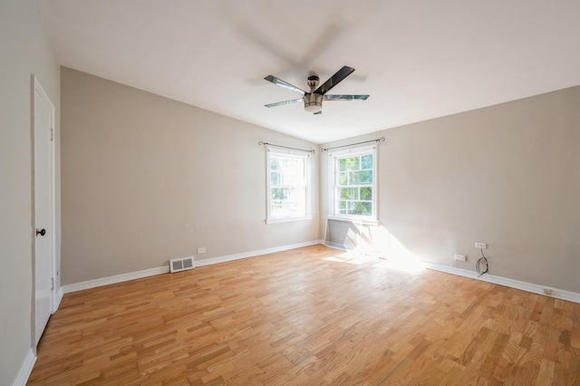 1578 Mccraren Rd, Highland Park, IL 60035 - spare room with a ceiling fan, light wood-style floors, and baseboards