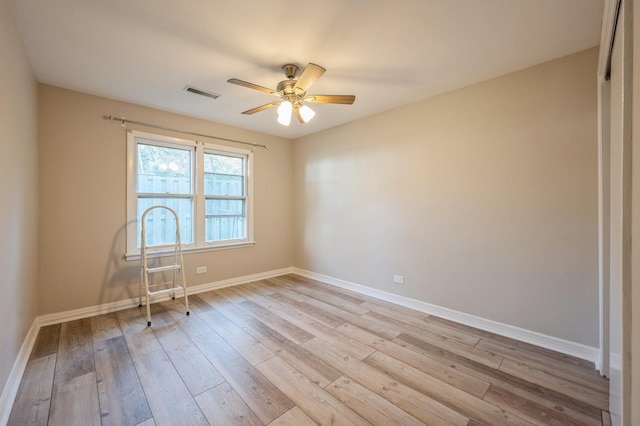 1578 Mccraren Rd, Highland Park, IL 60035 - unfurnished room featuring light wood-style floors, a ceiling fan, and baseboards