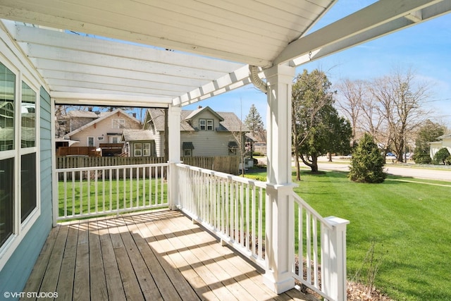 wooden deck featuring a yard, a pergola, a residential view, and covered porch