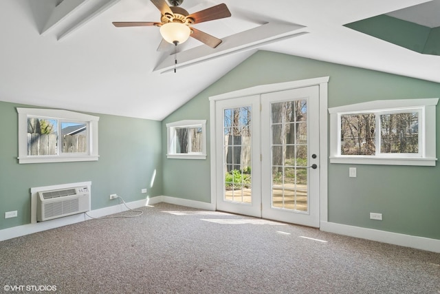 additional living space featuring a ceiling fan, carpet, an AC wall unit, and lofted ceiling