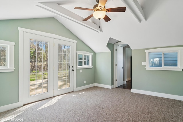 bonus room with carpet floors, baseboards, vaulted ceiling, and a wealth of natural light
