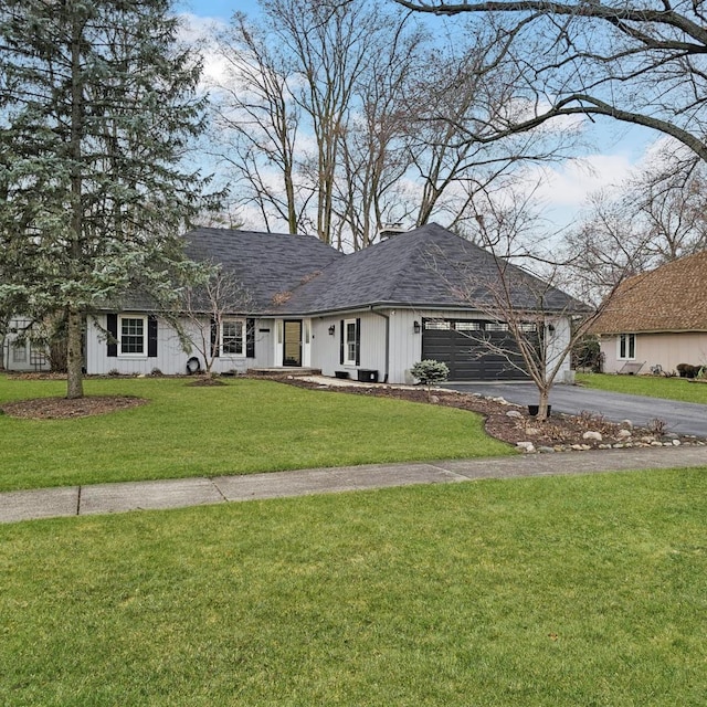 2S704 Cree Ln, Wheaton, IL 60189 - ranch-style house featuring board and batten siding, an attached garage, driveway, and a front yard