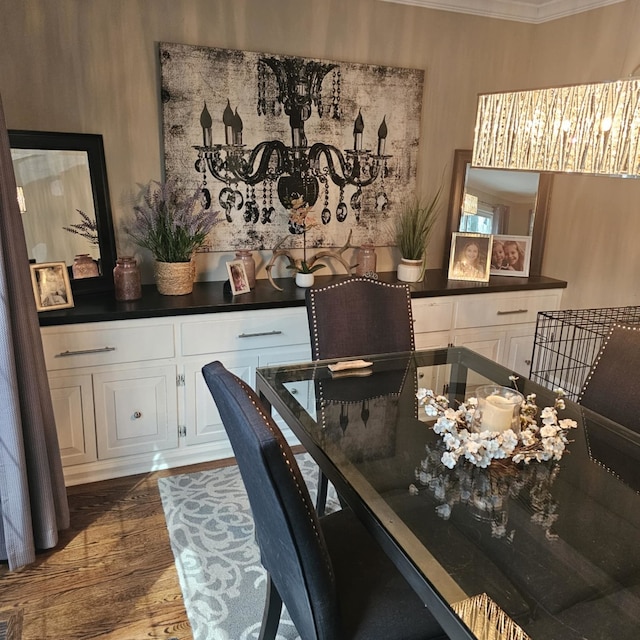 2S704 Cree Ln, Wheaton, IL 60189 - dining space with crown molding, a chandelier, and dark wood-style floors