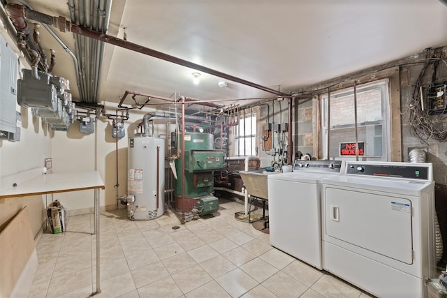 2642 N Harlem Ave Unit 2W, Elmwood Park, IL 60707 - clothes washing area featuring laundry area, gas water heater, a sink, independent washer and dryer, and light tile patterned floors