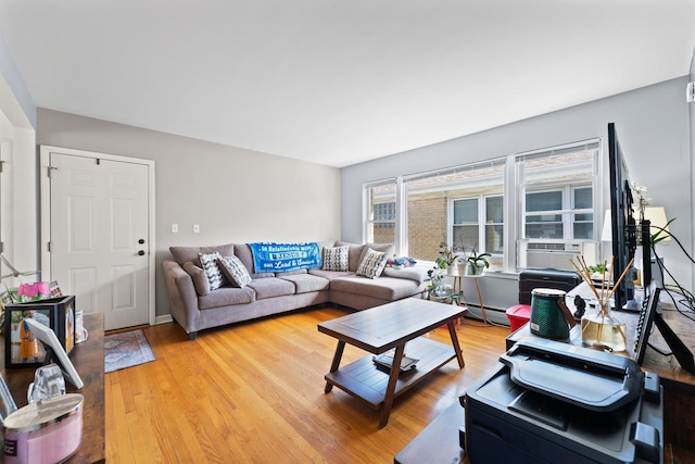 2642 N Harlem Ave Unit 2W, Elmwood Park, IL 60707 - living area with light wood-style floors, cooling unit, and baseboard heating