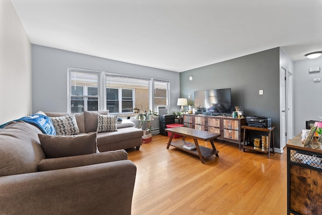 2642 N Harlem Ave Unit 2W, Elmwood Park, IL 60707 - living area with a baseboard heating unit and light wood-type flooring