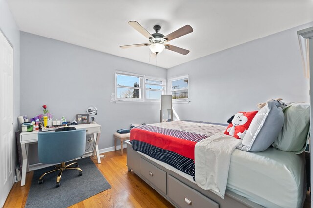 2642 N Harlem Ave Unit 2W, Elmwood Park, IL 60707 - bedroom with light wood-style floors, baseboards, and ceiling fan