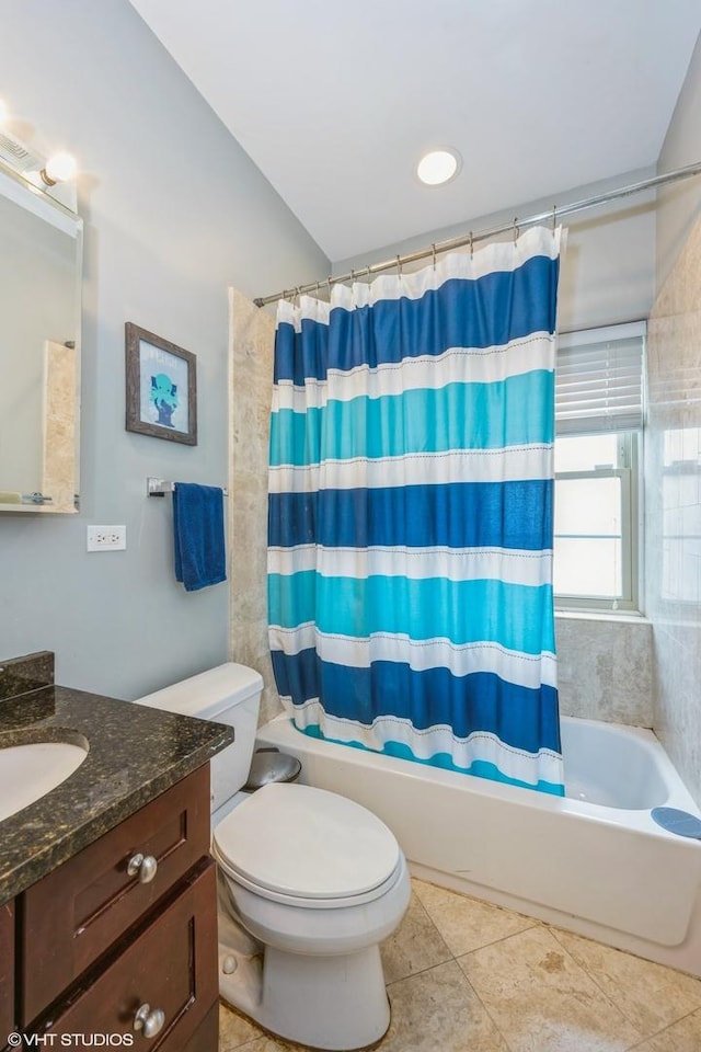 full bath featuring vanity, tile patterned flooring, toilet, and shower / bathtub combination with curtain