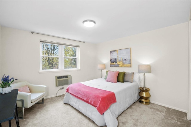 carpeted bedroom with baseboards and a wall unit AC