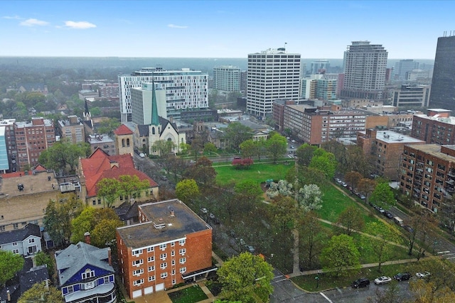 birds eye view of property with a city view