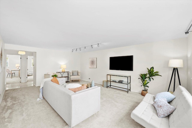 living room with light colored carpet