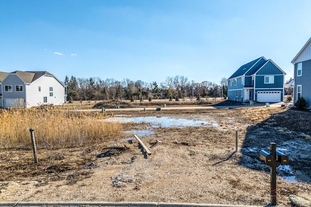 view of yard with a garage