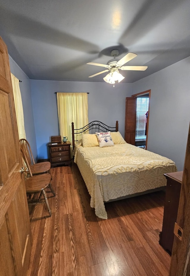 526 Osage St, Joliet, IL 60432 - bedroom with dark wood-style flooring and a ceiling fan