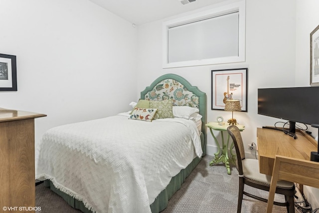 bedroom with carpet and visible vents