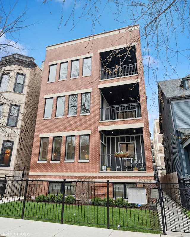 view of building exterior featuring a fenced front yard