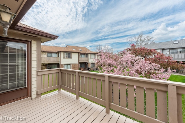 wooden deck with a residential view