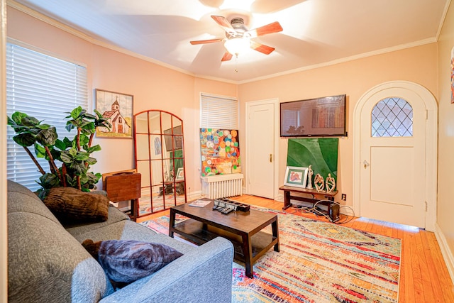8240 S Champlain Ave, Chicago, IL 60619 - living room with light wood-style floors, a ceiling fan, baseboards, and ornamental molding