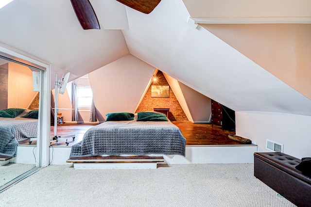 8240 S Champlain Ave, Chicago, IL 60619 - carpeted bedroom with visible vents and vaulted ceiling