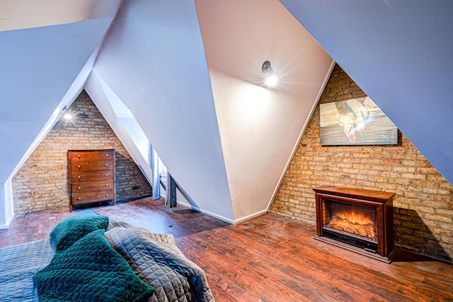 8240 S Champlain Ave, Chicago, IL 60619 - bedroom with a glass covered fireplace, wood finished floors, and vaulted ceiling