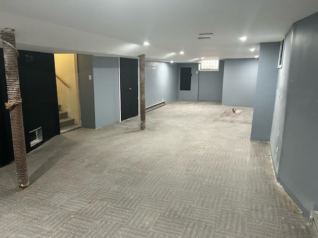 8240 S Champlain Ave, Chicago, IL 60619 - basement with carpet floors, recessed lighting, stairway, and a baseboard radiator