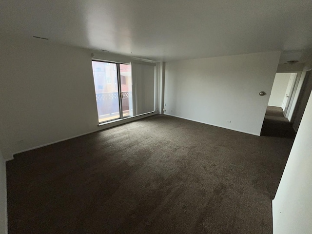 300 Park Ave Unit 443, Calumet City, IL 60409 - empty room featuring dark colored carpet