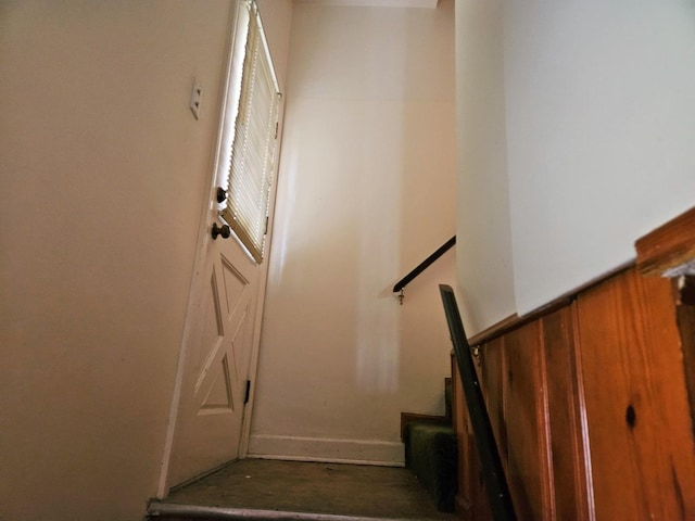 stairway with baseboards