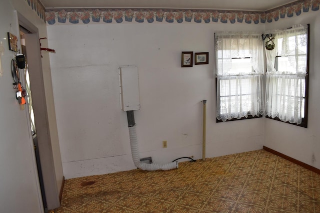 empty room with tile patterned floors