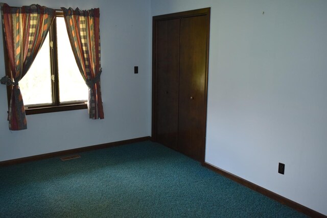 17864 E 1700 N Rd, Pontiac, IL 61764 - empty room featuring baseboards, carpet flooring, and visible vents