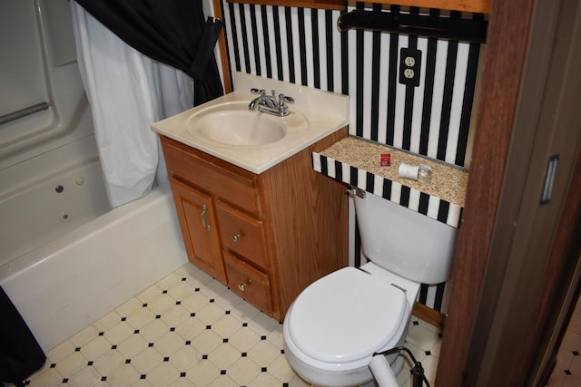 full bathroom featuring vanity, shower / bathtub combination with curtain, tile patterned floors, and toilet
