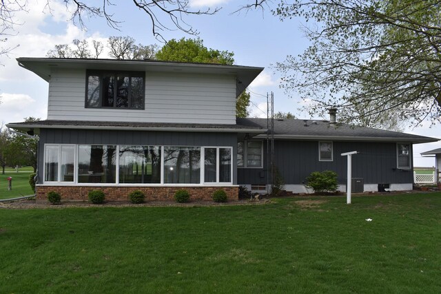 17864 E 1700 N Rd, Pontiac, IL 61764 - back of house featuring a lawn, brick siding, and central AC unit